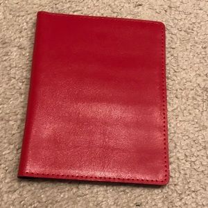 Red PASSPORT Holder.